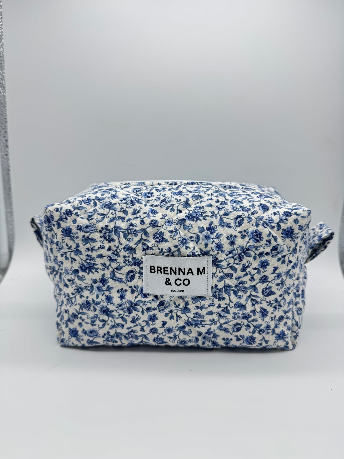 Delicate Blue Floral Quilted Makeup Bag