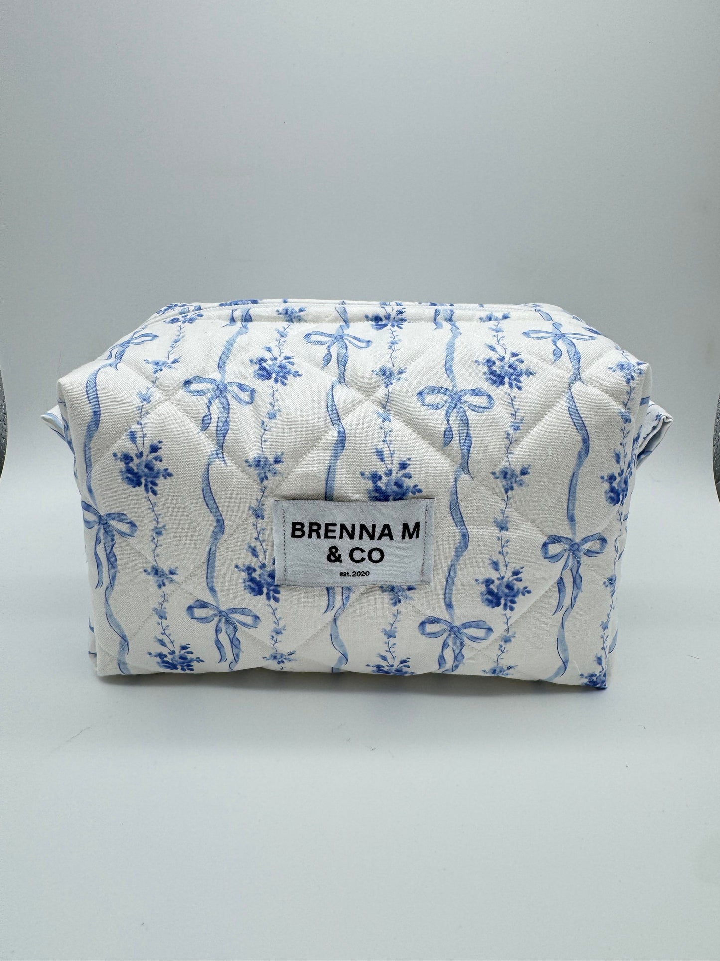 Blue Bow Quilted Makeup Bag