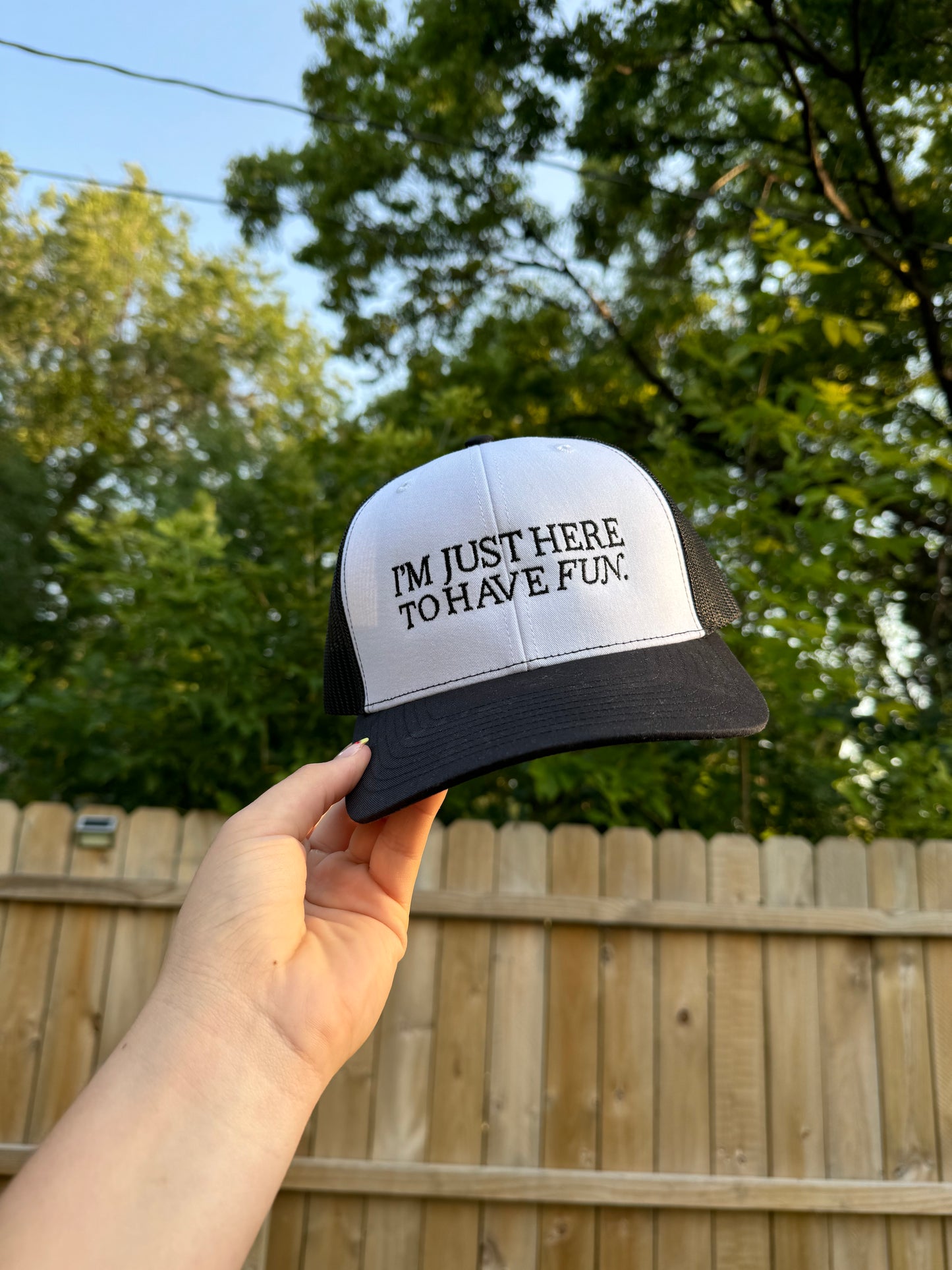 I'm Just Here To Have Fun Trucker Hat